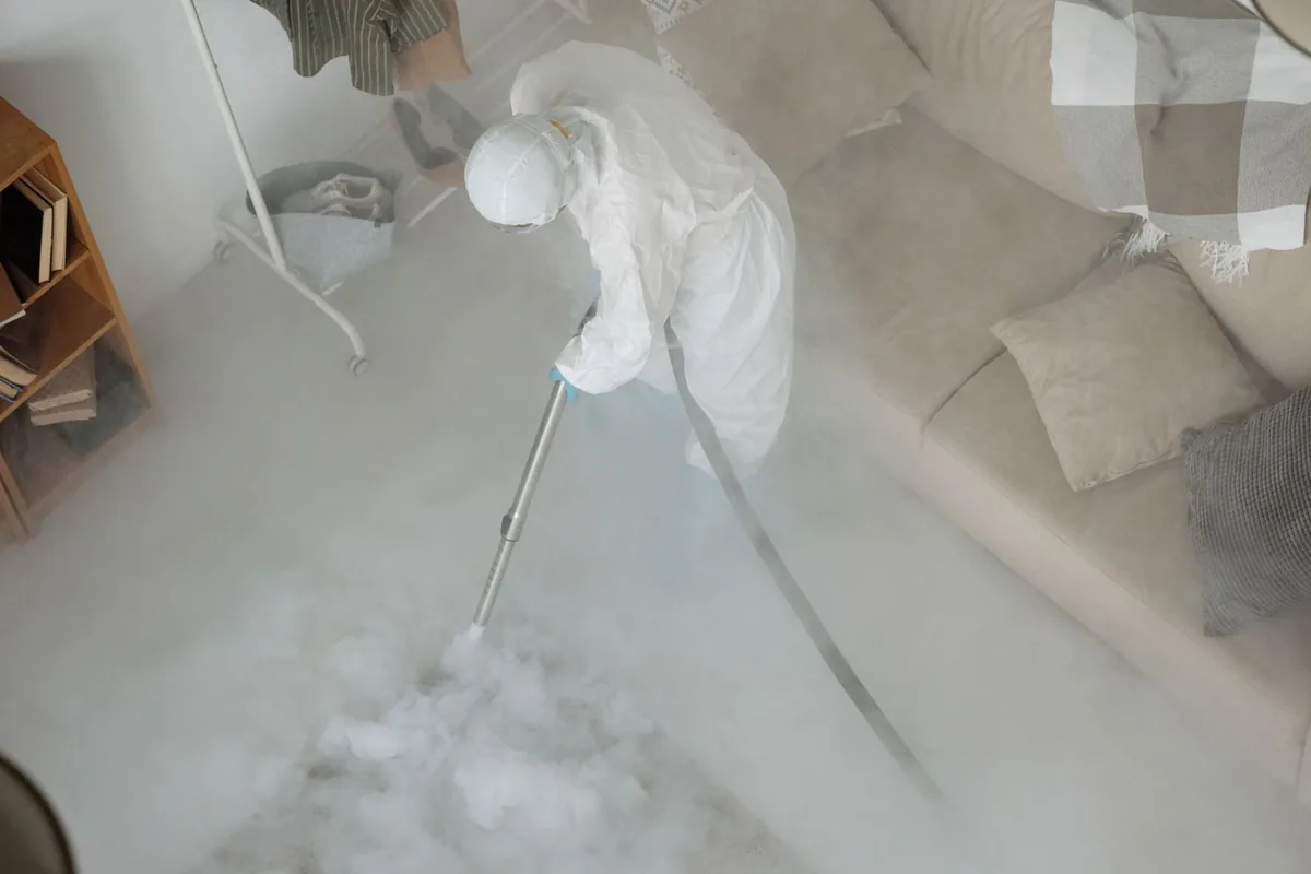 Biohazard cleanup technician in protective equipment, Largo, FL